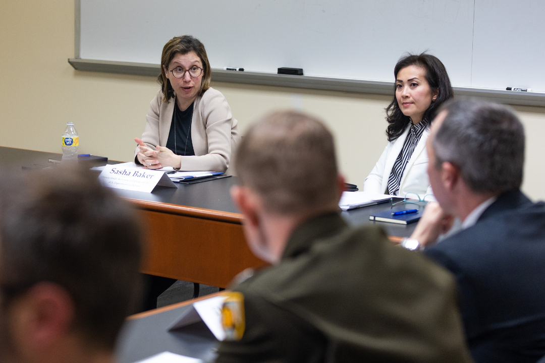 Sasha Baker and Elizabeth Phu talking at the DoD roundtable