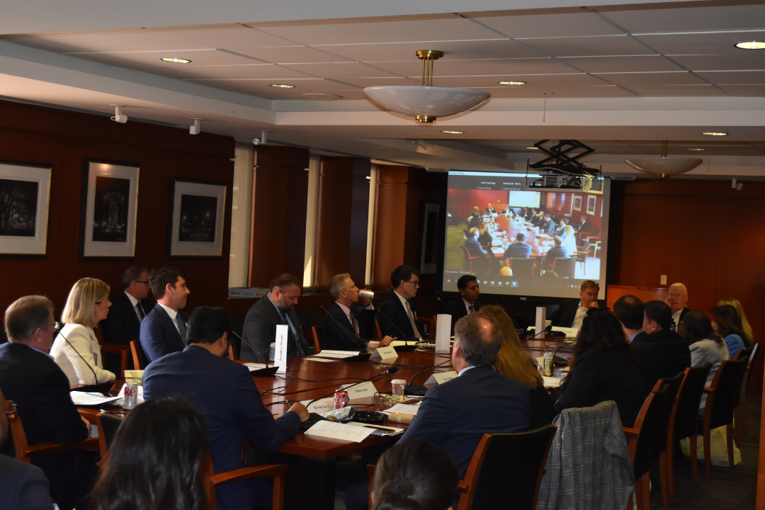 Panelists sitting at the roundtable discussing various PTAB topics