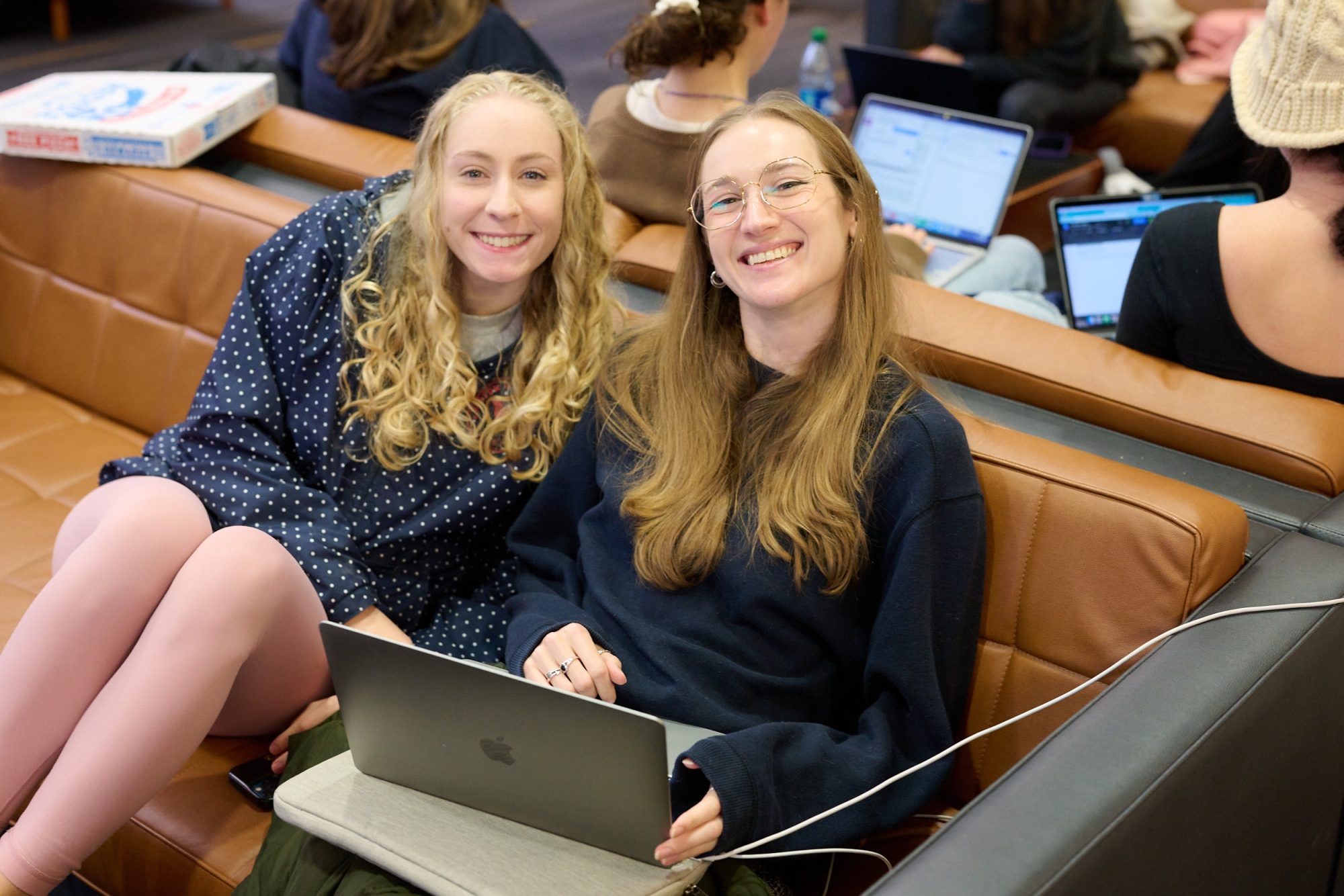 Students posing for photo in Kelly Lounge