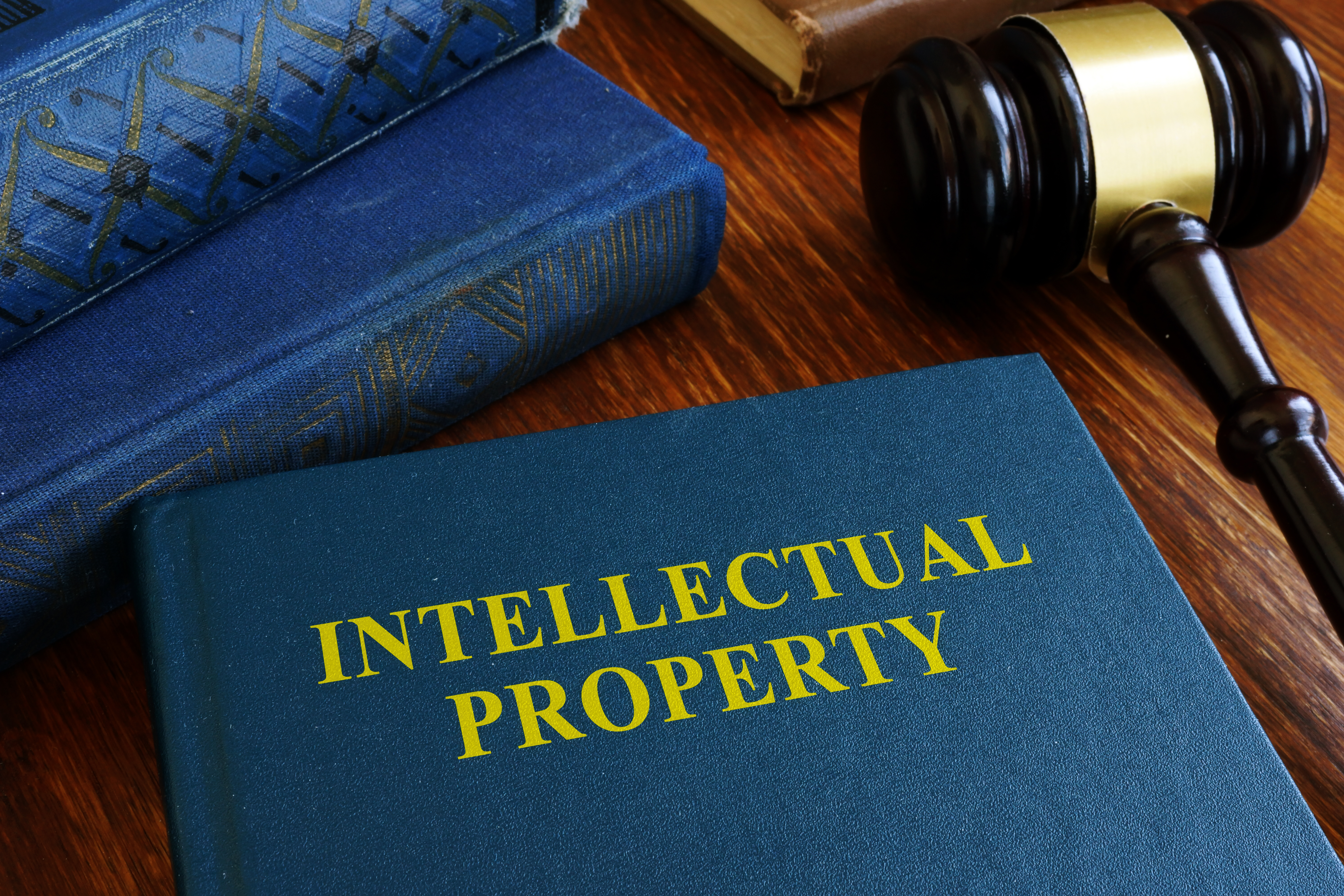 Intellectual Property book with a gavel next to it