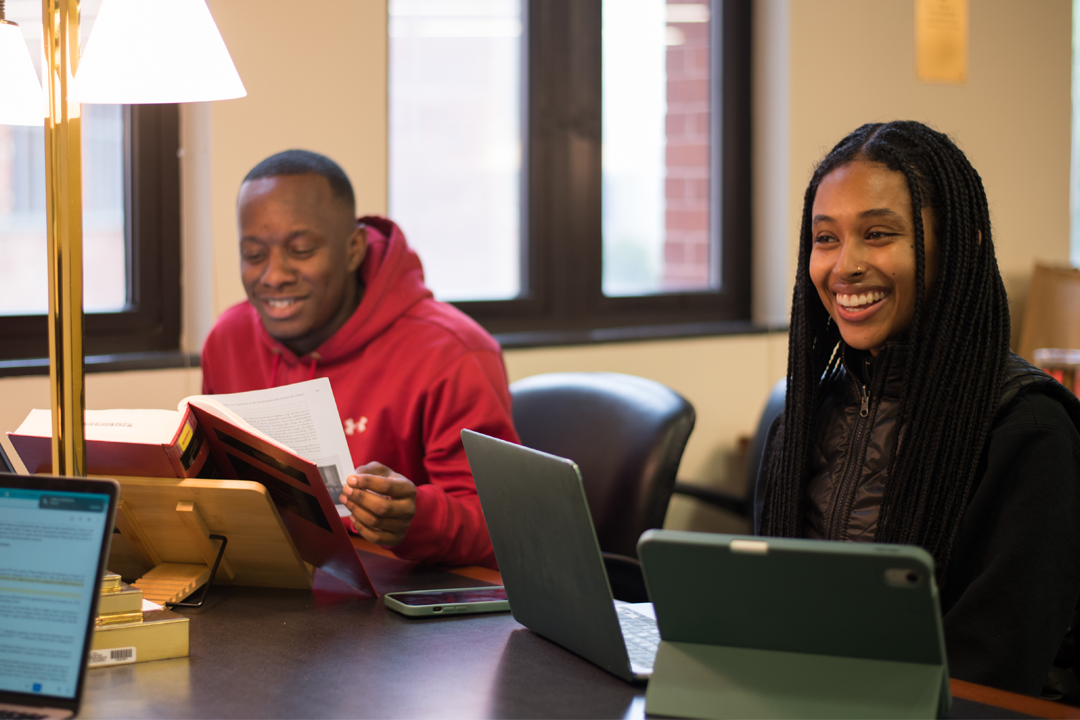 Students working in law library.