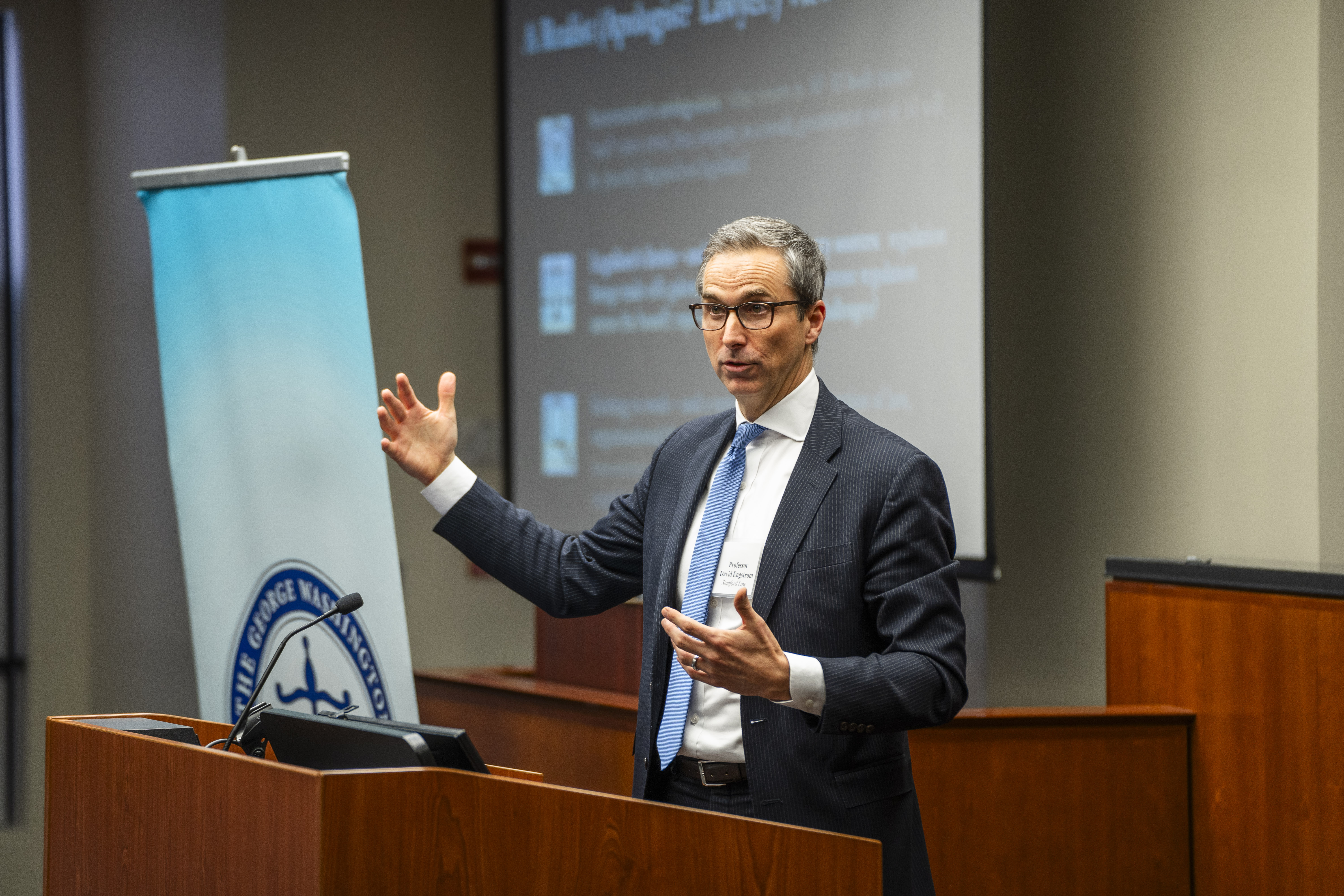 The George Washington Law Review's Vol. 92 Annual Symposium A man talking at a podium