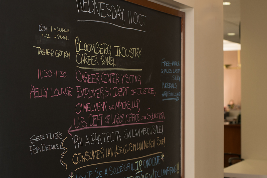 Chalkboard with a schedule written on it