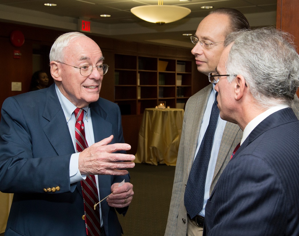 Don Dunner conversing with colleagues