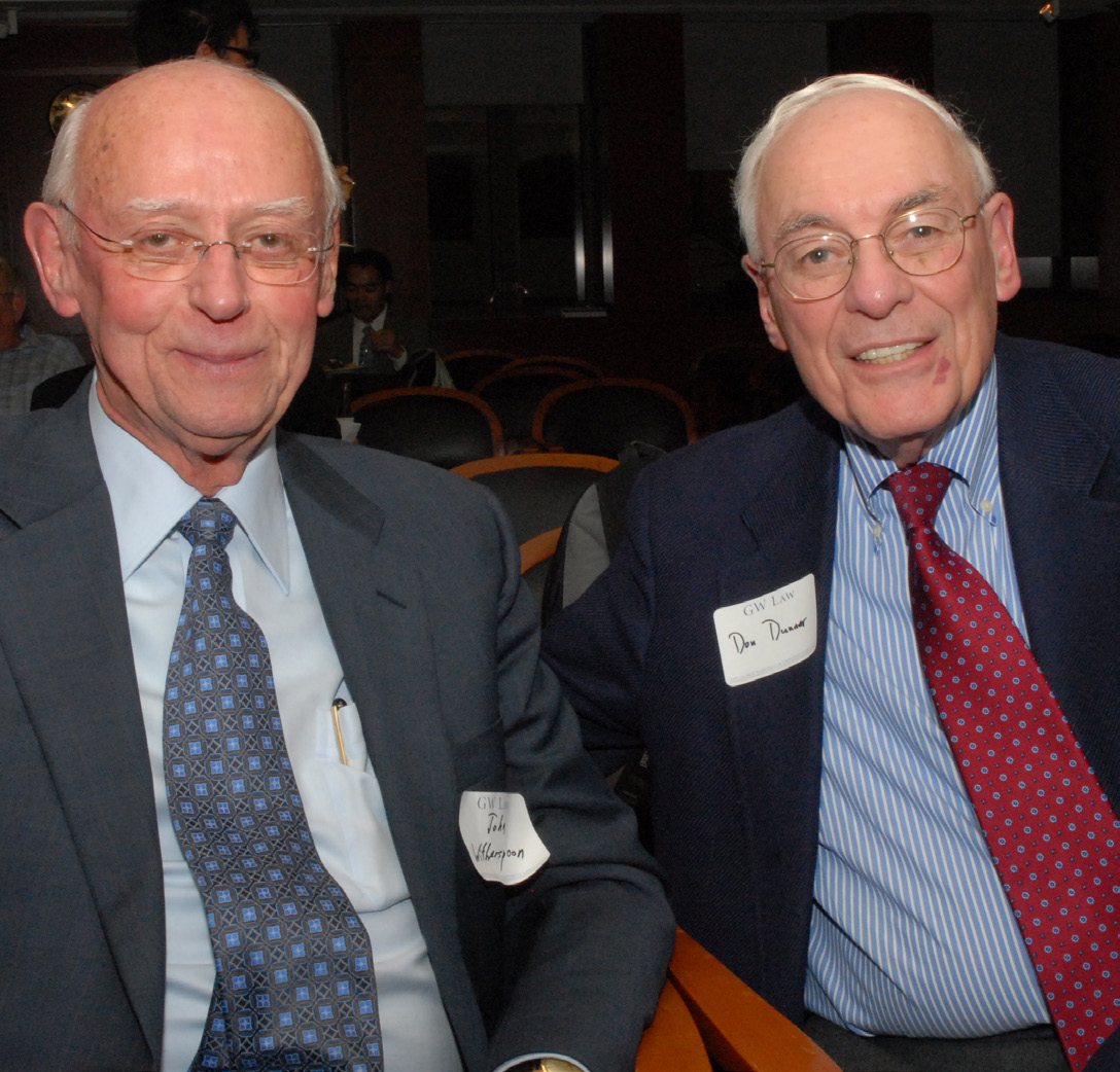 Don Dunner smiling with a colleague