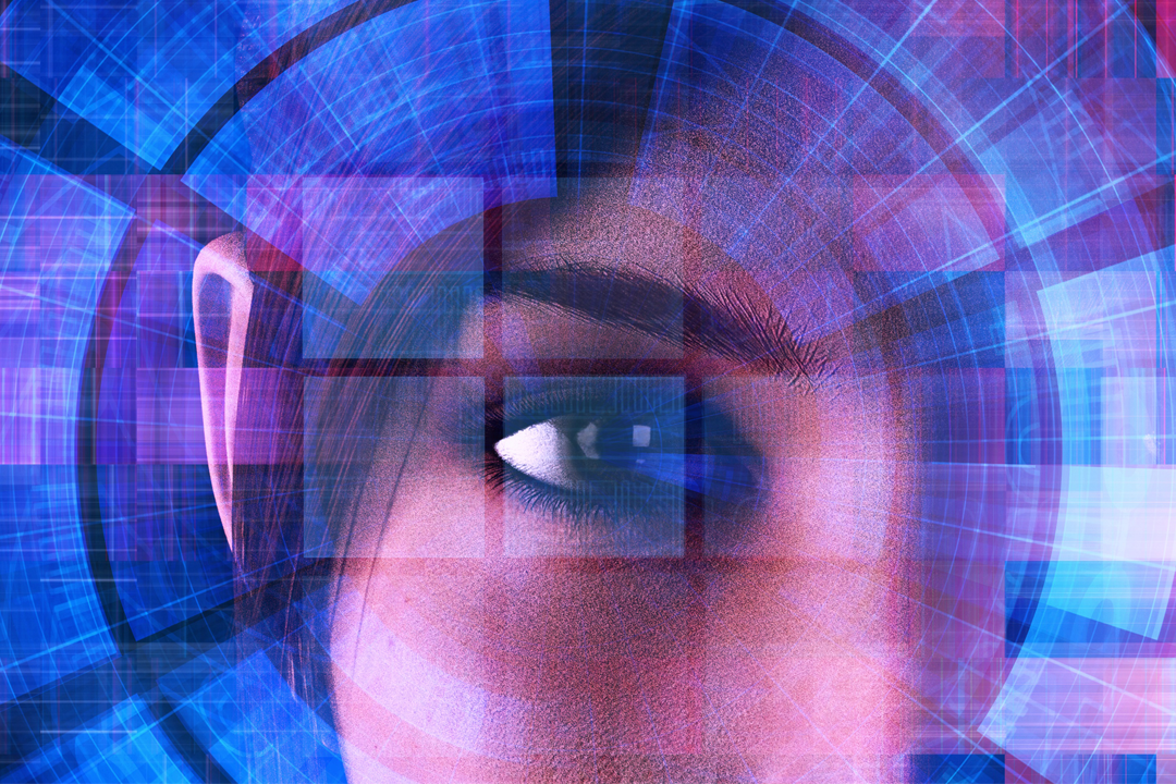 An eye looking through a digital scope