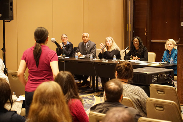 Dean Dayna Bowen Matthew on a panel answering an audience question