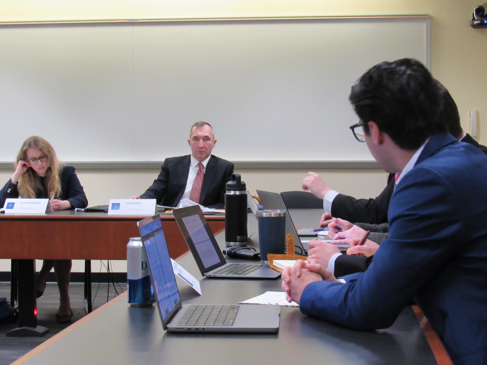 Schenck Competition Two judges in the Schenck competition with students in the foreground