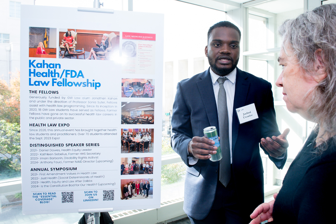 Kahan fellow speaking to someone about the fellowship