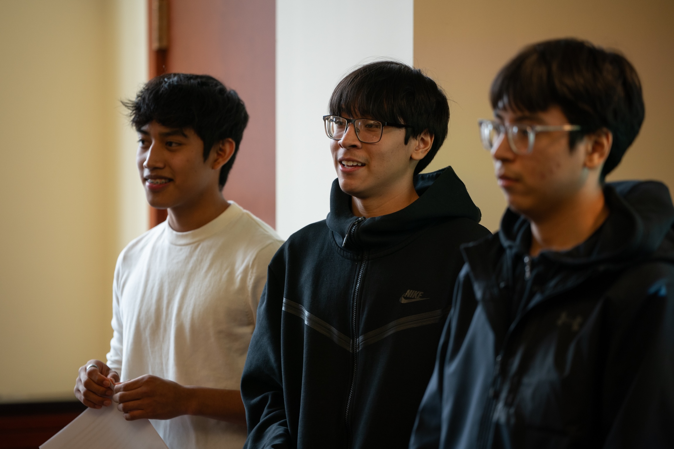 3 students giving a presentation