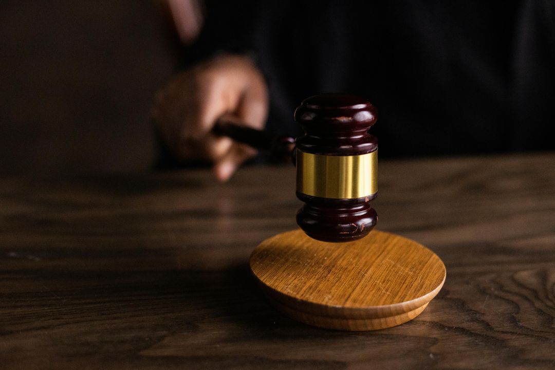 Gavel banging down on table