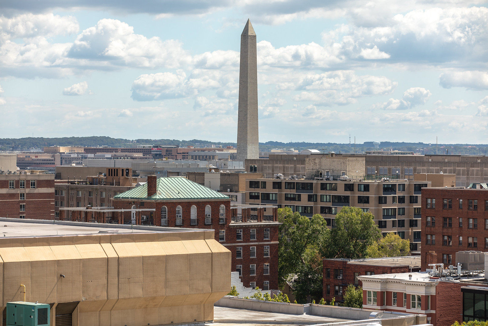 Aerial image of GW campus with Washington Monument visible in background