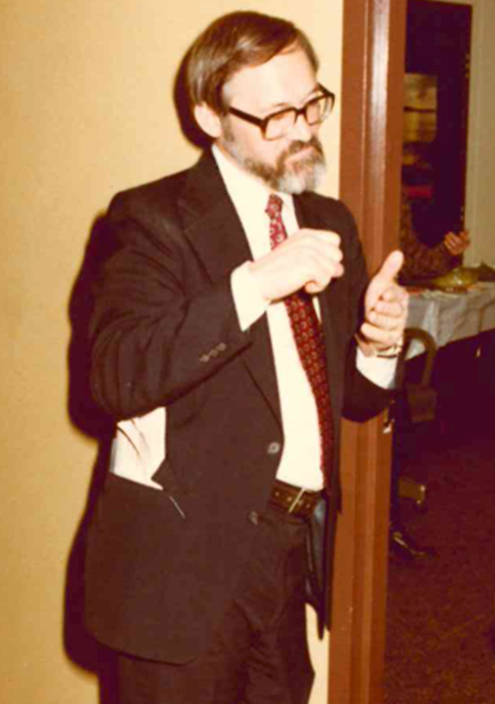 Photo of Jack Randle using sign language