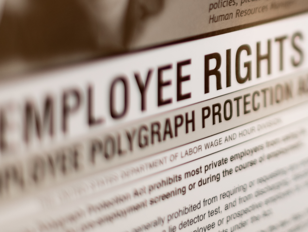 Newspaper heading "Employee Rights" with blurred vignette around text