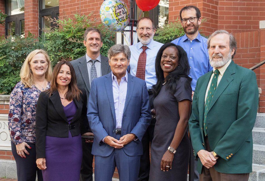 Photo of Bobby Burchfield, Dean Matthew, and GW Law Faculty Members