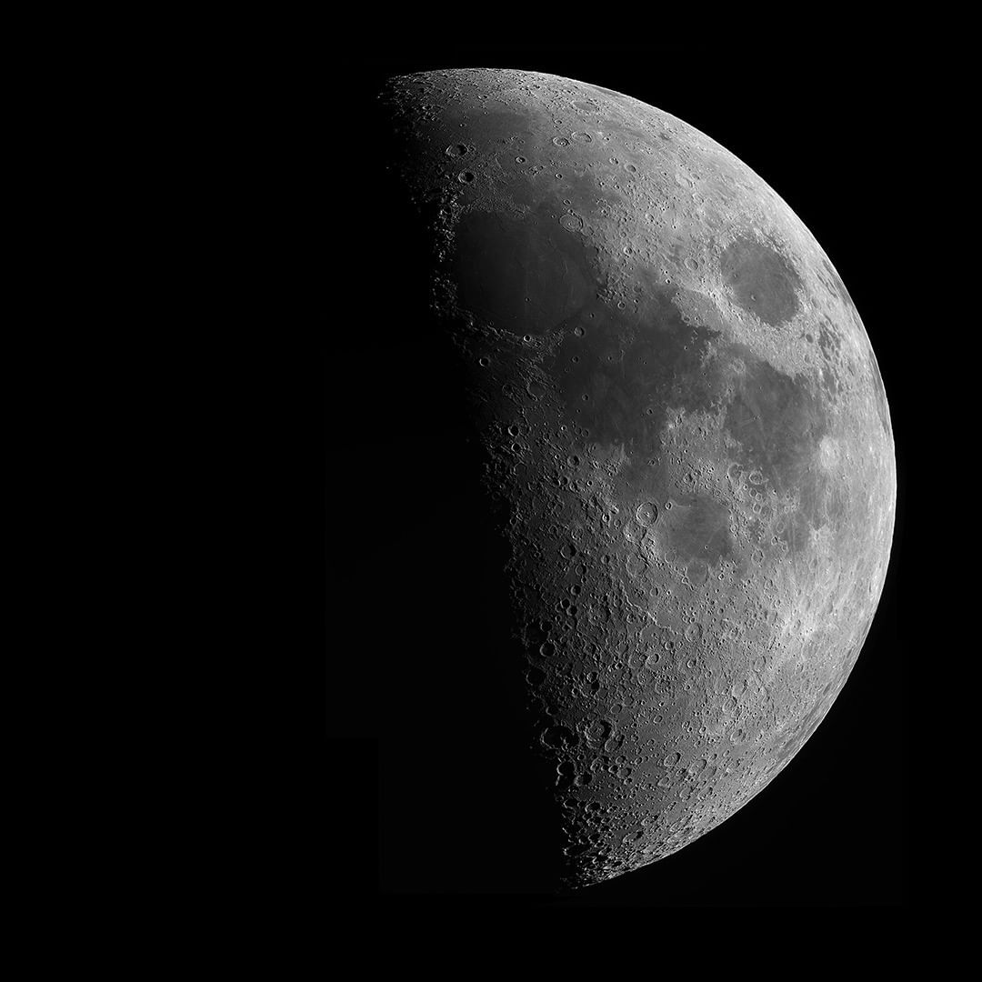 Photo of a half moon. Photo credit: Greg Revera