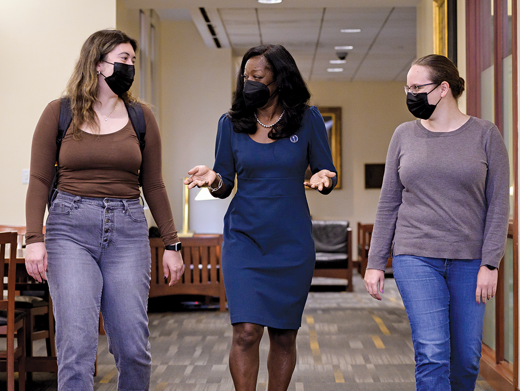 Dean Matthew walking with students