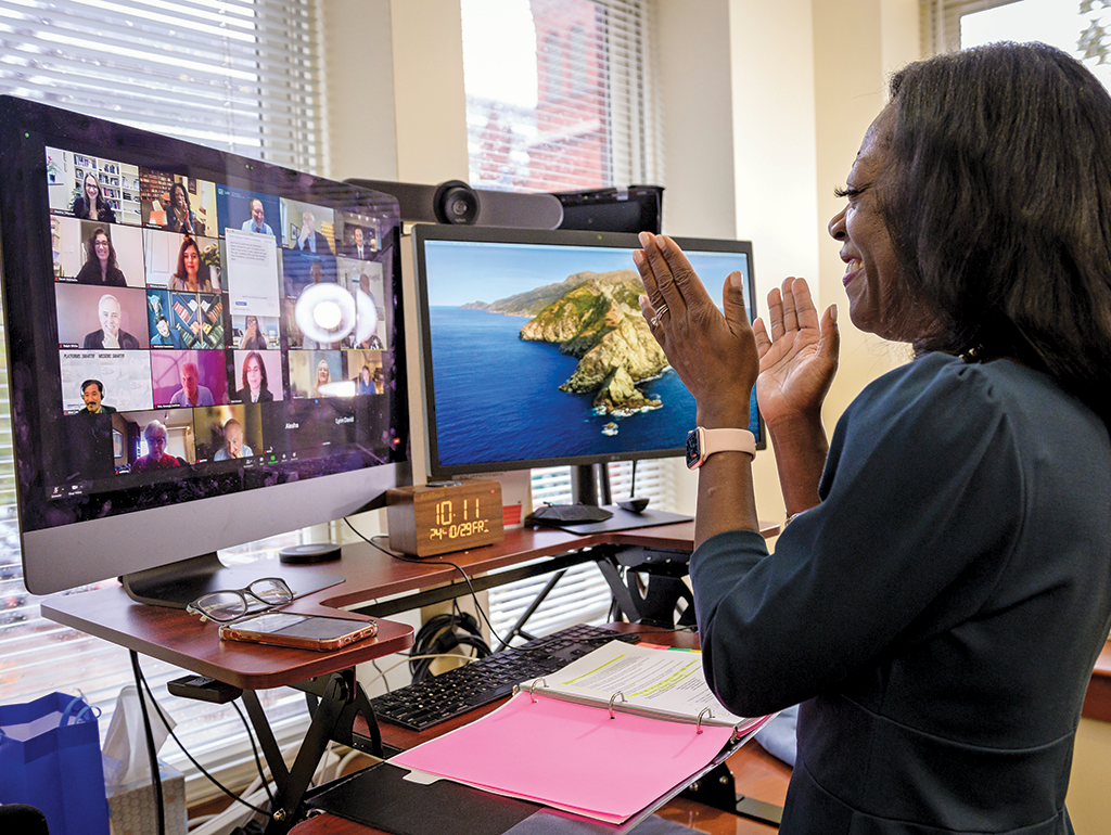 Dean Matthew on a Zoom call with GW Law Faculty