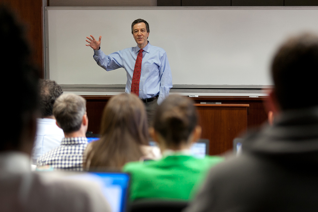 Professor Robert L. Glicksman teaches in the front of a classroom.