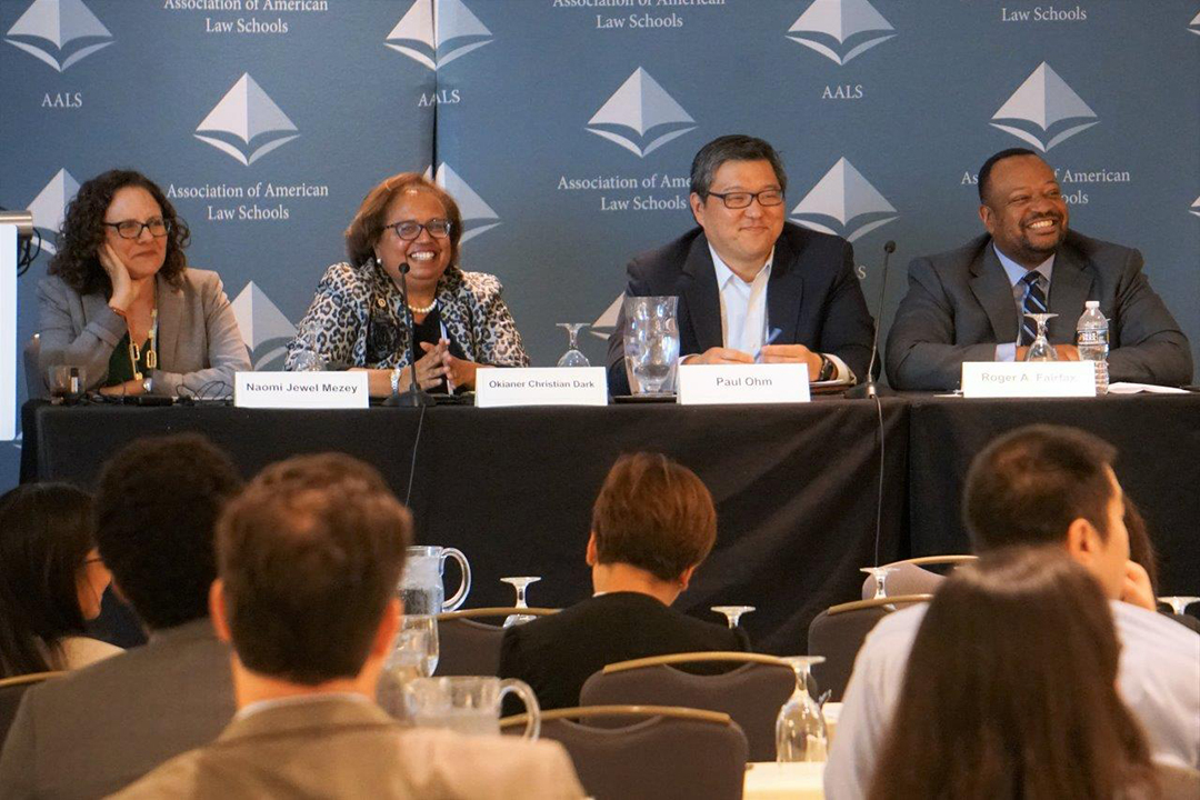 Professor Roger A. Fairfax, Jr. sits on a plenary session at the AALS workshop.