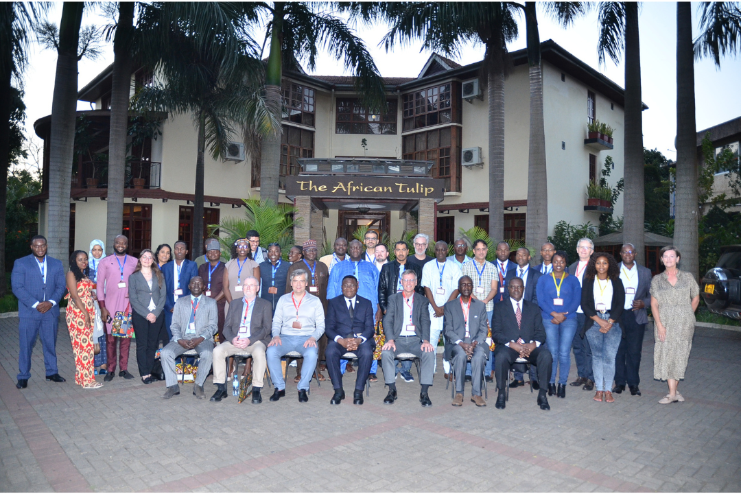 A group people in front of The African Tulip