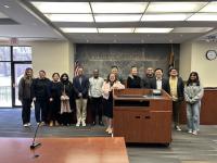 People pose after the International and Comparative Law program hearing with the U.S. Court of International Trade.