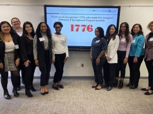 Yue Meng stands with other female entrepreneurs for a photo