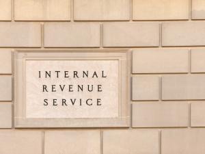 Image of a brick wall with "Internal Revenue Service" engraved