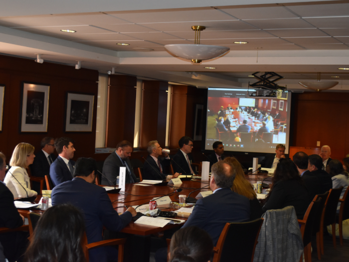 Panelists sitting at the roundtable discussing various PTAB topics