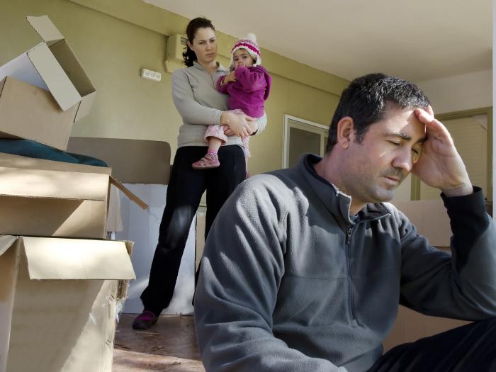 Family sad being evicted from their home
