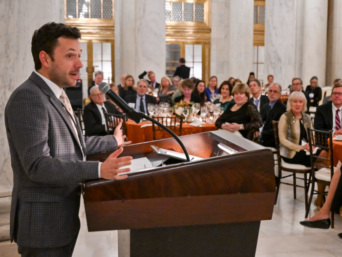 Professor Charles Tyler accepting the Eisenberg prize and giving a speech