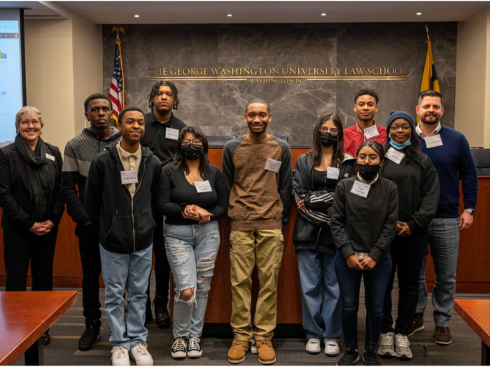 Dean Kathy Hessler with Coolidge High School students and a teacher