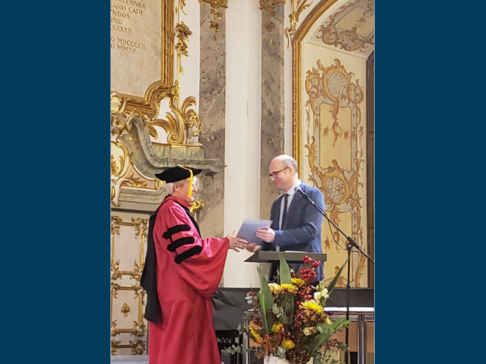 Professor Brauneis receiving his honorary doctorate in law