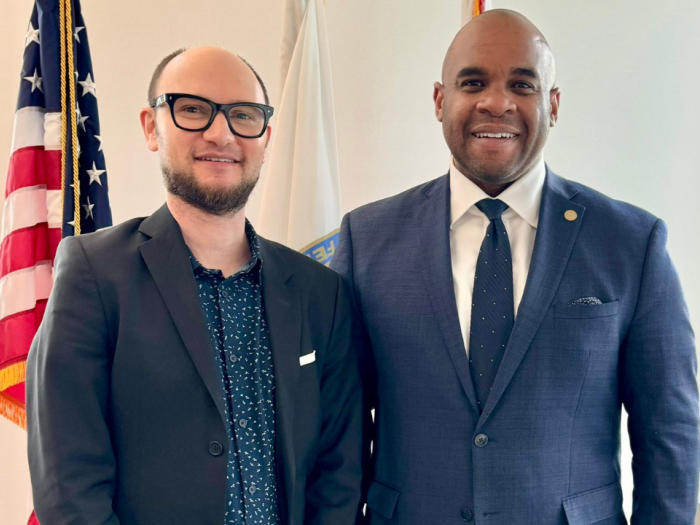 Andrew Satten and Commissioner Willie Phillips