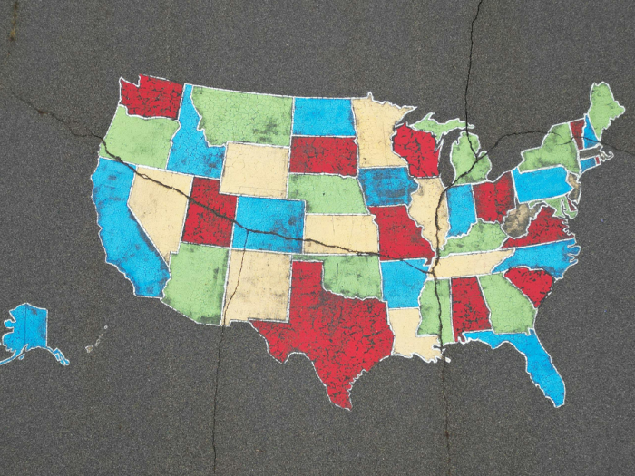 Colorful Map of USA on Asphalt