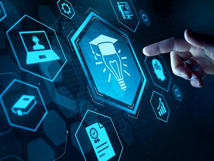 Digital graphic with a lightbulb wearing a graduation hat