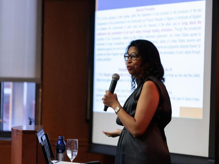 Mélida Hodgson speaking at the Brand-Manatt lecture.