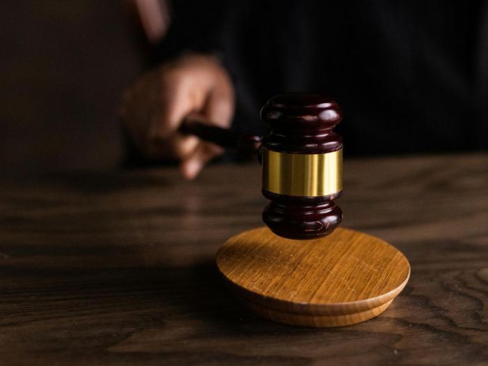 Gavel banging down on table