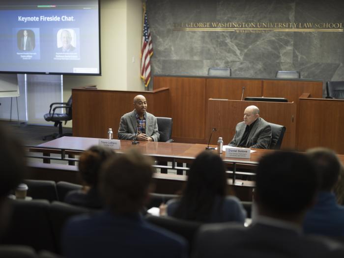 GW Law Professor Daniel Solove and Travis LeBlanc, of Cooley LLP, speak during a fireside chat at the GW JOLT Symposium.