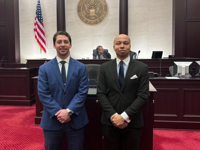 Trey Donathan and Will Shorter pose for a photo at the Giles Rich Intellectual Property Moot Court Competition.