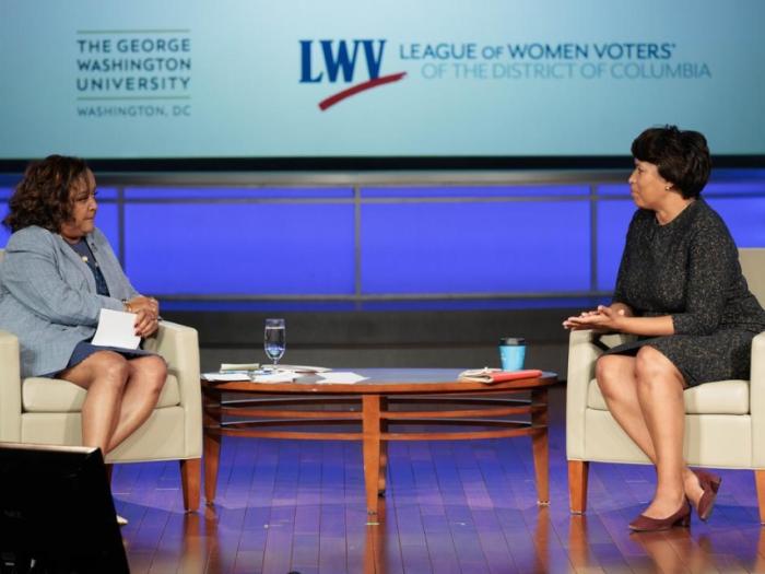 Two women on stage for AG Candidates Forum