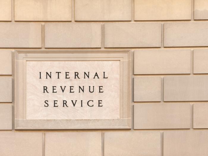 Image of a brick wall with "Internal Revenue Service" engraved
