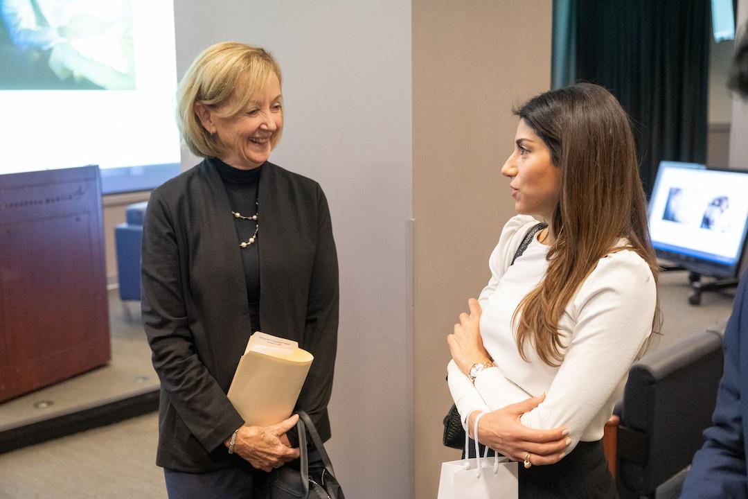 Maryanne Lavan talking to a GW Law student