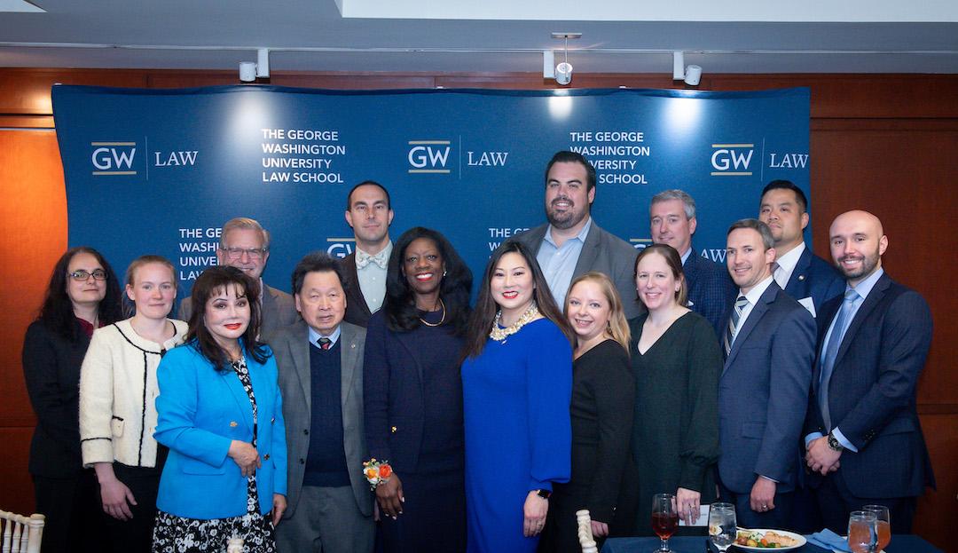 Dean Dayna Bowen Matthew, Caroline Pham, and the attendees of the luncheon