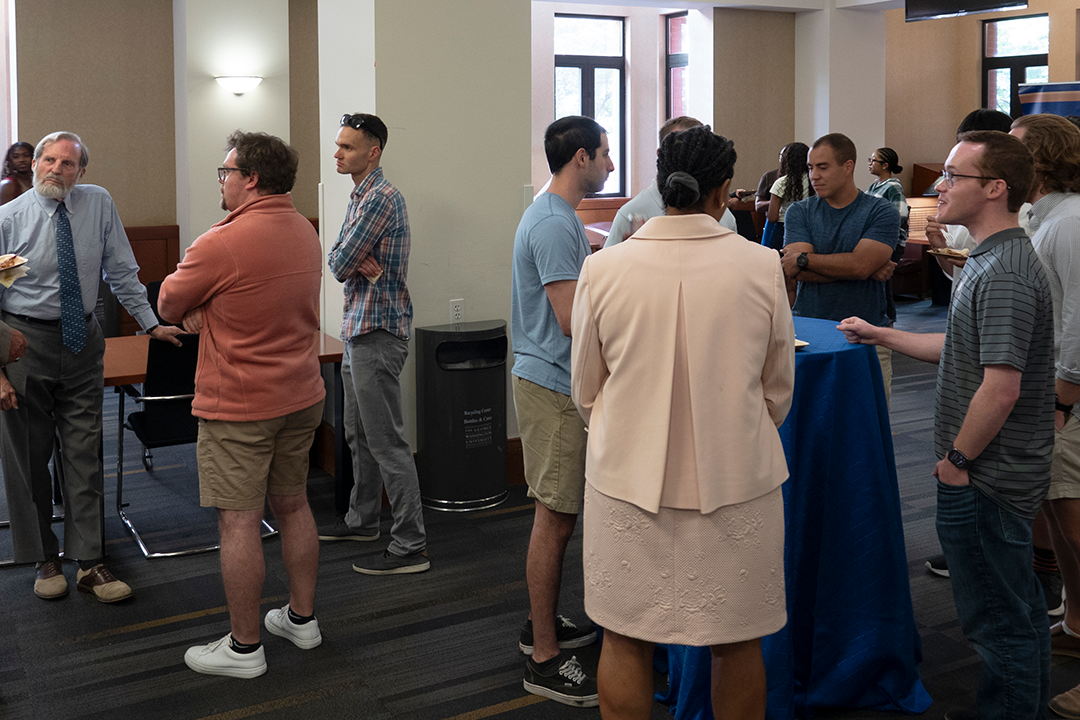Veterans Reception attendees enjoying talking after the speeches.