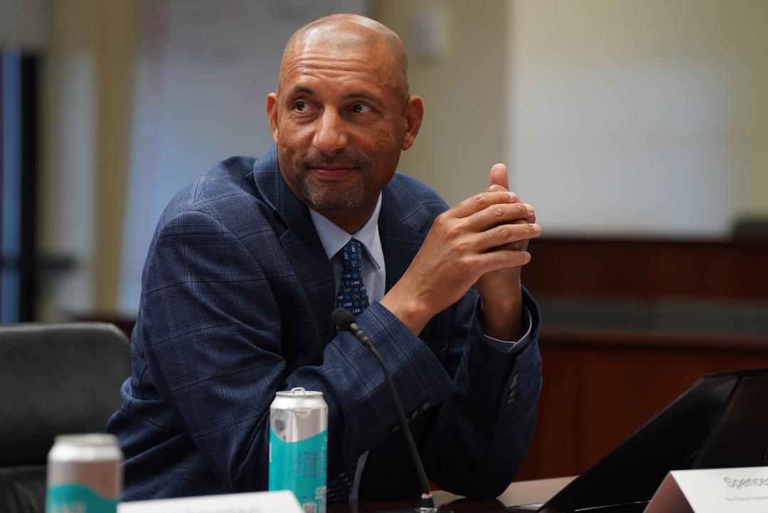 GW Law professor Spencer Overton listens to his colleagues at the supreme court preview panel.