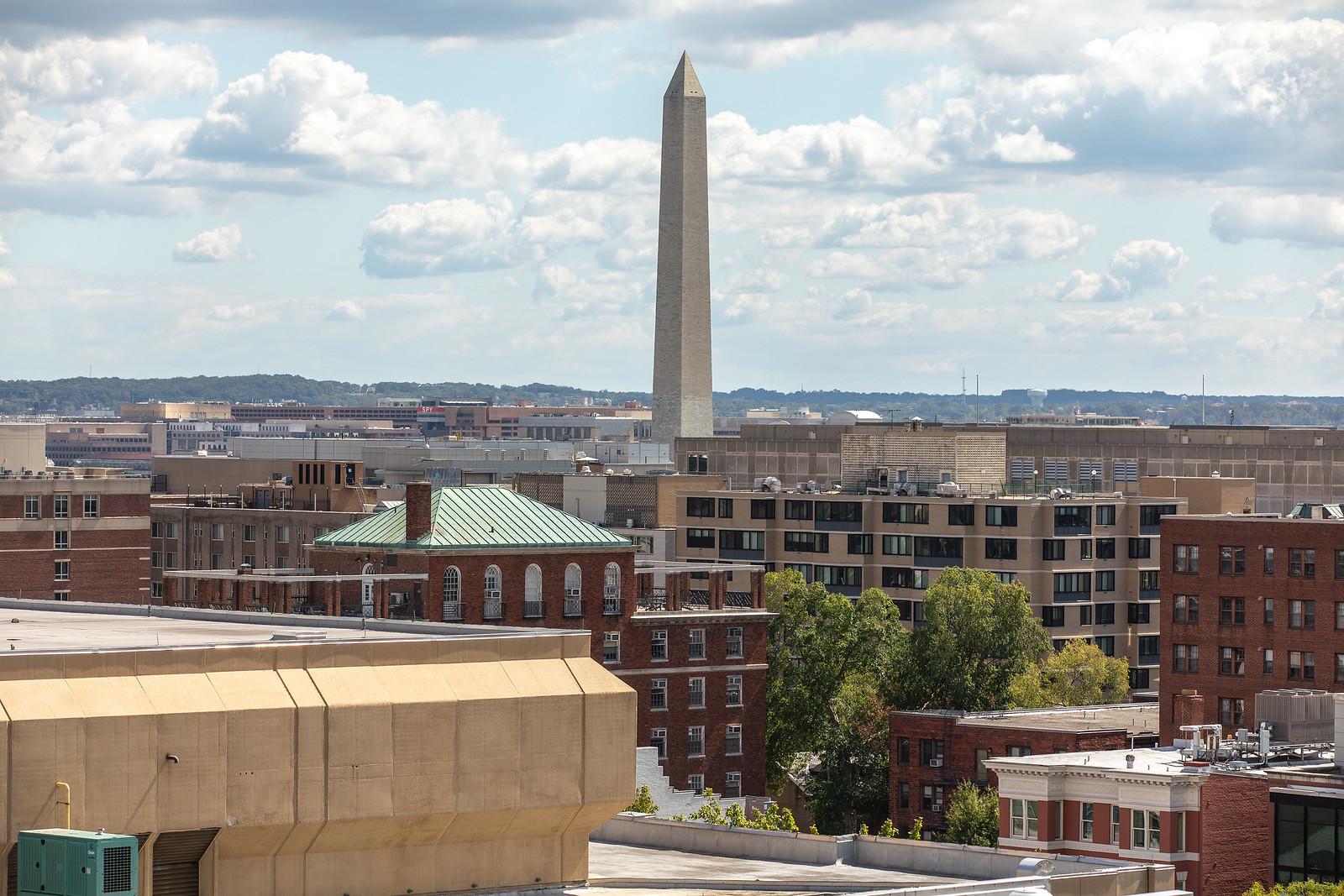 Aerial image of GW campus with Washington Monument visible in background