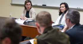 Sasha Baker and Elizabeth Phu talking at the DoD roundtable