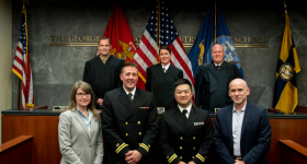 Appellate judges Captain Amanda Myers, Colonel Peter Houtz, and Captain Colin Kisor with the defendants and plaintiffs