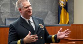 Navy Rear Admiral Jonathan Stephens talks to students during a GW Law event.